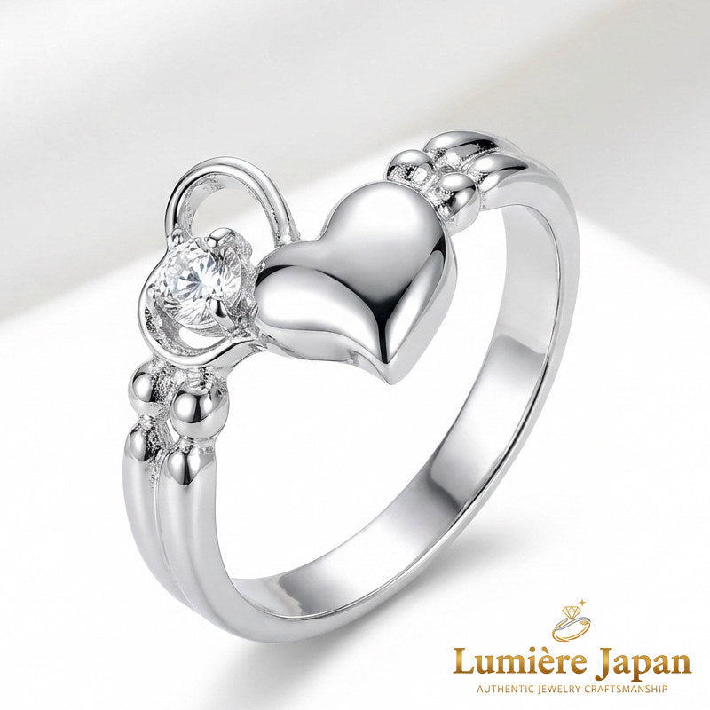 新商品｜日本製 Jump Heart CZ Ring（ジャンプハートCZリング） 手元で跳ねる、可愛いの一歩先へ。 ピンクゴールド プラチナ 仕上げ 2カラー展開