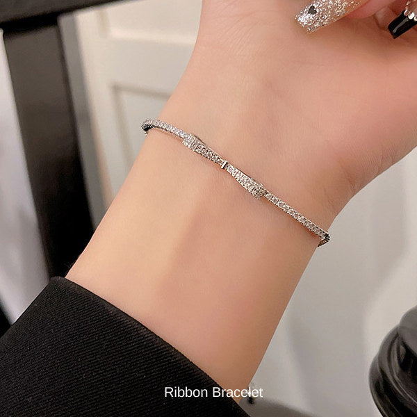 新商品 ブレスレット レディース 大人可愛い サイズフリー リボンブレスレット プラチナ仕上げ 誕生日 ギフト プレゼント セール