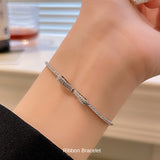 新商品 ブレスレット レディース 大人可愛い サイズフリー リボンブレスレット プラチナ仕上げ 誕生日 ギフト プレゼント セール