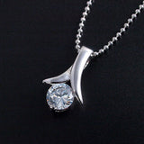 Limited Quantity [Treasure Chest] Elegance is the key! Features a 6mm CZ! A classic, popular swing necklace with a platinum finish