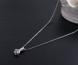 Limited Quantity [Treasure Chest] Elegance is the key! Features a 6mm CZ! A classic, popular swing necklace with a platinum finish
