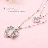 Limited edition: Double open heart necklace with double chain, platinum finish, specially designed for the grown woman and the young lady.