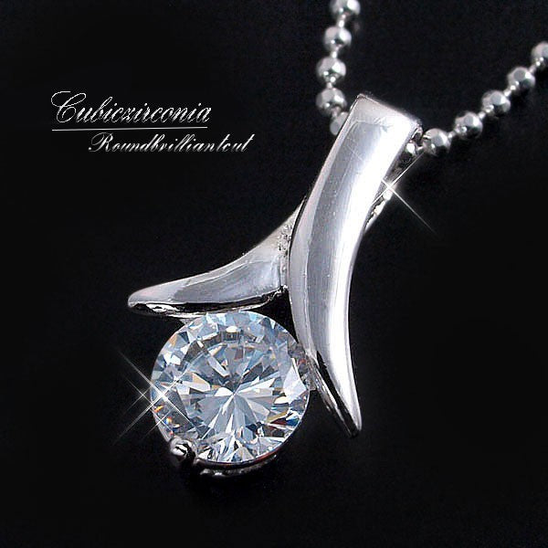 Limited Quantity [Treasure Chest] Elegance is the key! Features a 6mm CZ! A classic, popular swing necklace with a platinum finish